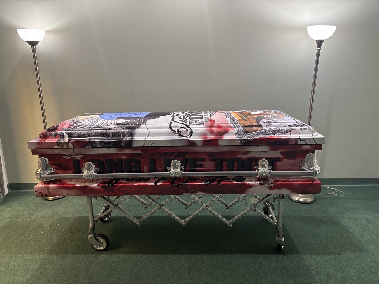 Custom red, black, and white full casket wrap