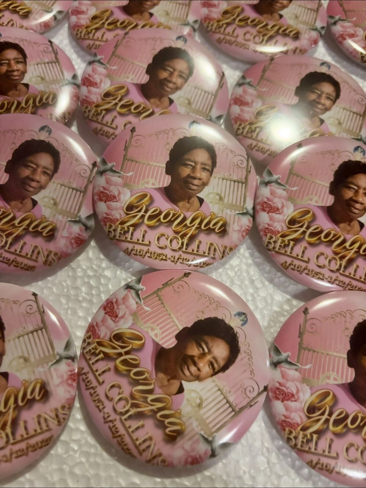 Collection of custom pink memorial photo buttons